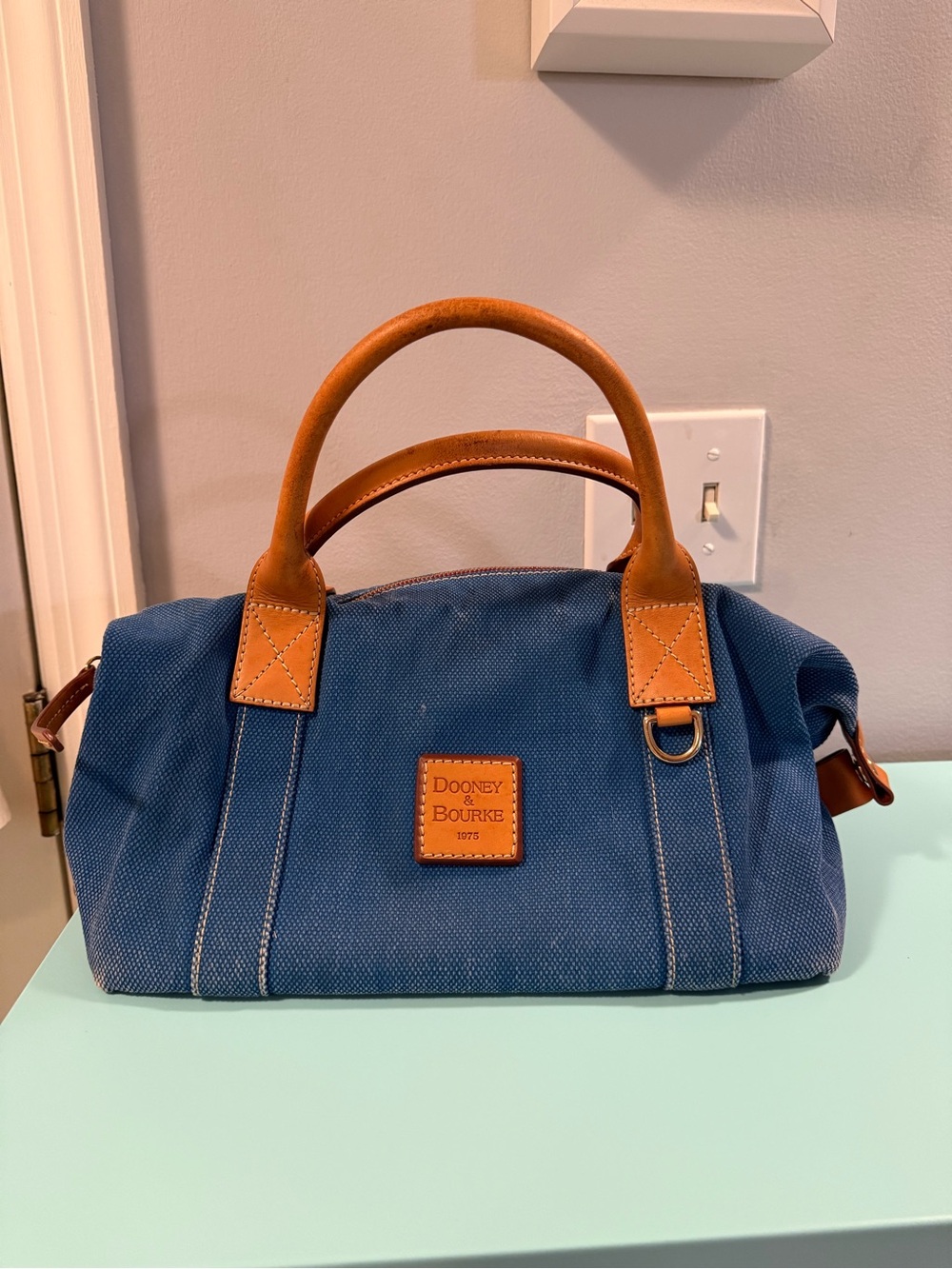Dooney & Bourke Blue Canvas Toiletry Bag with Brown Leather Trim